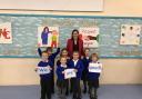 Delighted - Headteacher Katie Siggery with Burrsville pupils.