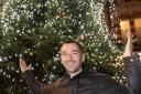 Former Coronation Street star Charlie Condou in front of Clacton's Christmas tree last year