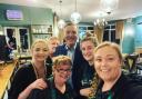 Phil Tufnell with catering staff at Frinton Golf Club.