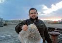 TOP PRIZE: Jon Wilson with the thornback ray that helped him gain first place in Walton Sea Angling Club’s latest match.