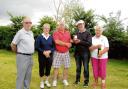 LEADING QUARTET: back nine winner Mike Scott, front nine winner Doreen Brand, Colin Bull, presenting the trophy to Peter Thurlow, and Muriel Warbey, who was nearest the pin for the ladies. Thurlow was also nearest the pin for the men.