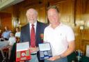 ALL SMILES: Frinton Golf Club captain Malcolm King was part of the team that won the Hills Prospect day designated ball stableford while Kevin Smith won the Golf Week Medal and the Philip Robinson Medal, at the club’s Golf Week.