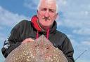 GREAT CATCH: Clacton Boat Club member Ron Woolsey with this fine-looking 14lb thornback ray.