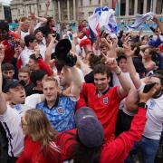 Celebrations - England fans celebrate after the UEFA Euro2020 win over Germany                                          Main picture: Victoria Jones/PA Wire




 round of 16 match between England and Germany at the Trafalgar Square Fan Zone in
