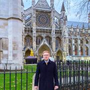 Proud - Edward Bell standing outside Westminster Abbey