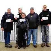 FESTIVE CHEER: The winners of   Walton Sea Angling Club’s Boxing Day Open match, on Walton Pier.