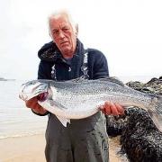 John Clarke with his 12lb bass caught from his own boat Snow Goose.