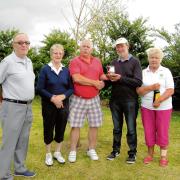 LEADING QUARTET: back nine winner Mike Scott, front nine winner Doreen Brand, Colin Bull, presenting the trophy to Peter Thurlow, and Muriel Warbey, who was nearest the pin for the ladies. Thurlow was also nearest the pin for the men.