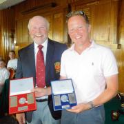 ALL SMILES: Frinton Golf Club captain Malcolm King was part of the team that won the Hills Prospect day designated ball stableford while Kevin Smith won the Golf Week Medal and the Philip Robinson Medal, at the club’s Golf Week.