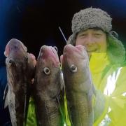 TOP TRIO: Colchester angler Chris Mills with three codling, caught from Walton Pier.