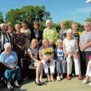 WELL DONE: Clacton Golf Club’s Lady Captain’s Day winner Denise Pink surrounded by lady past captains of the club.