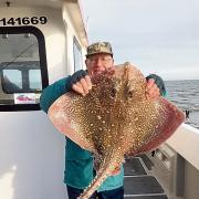 NICE CATCH: Tony Holt with a 19lb 2oz thornback ray, caught from the Brightlingsea charter boat Sea Watch.