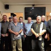 PRIZE-TIME: Colchester Sea Angling Club members with their prizes.