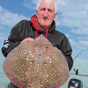 GREAT CATCH: Clacton Boat Club member Ron Woolsey with this fine-looking 14lb thornback ray.