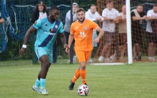 Goal rush: Nnamdi Nwachuku (left) in action for Braintree Town during their 6-1 friendly win at Holland FC.