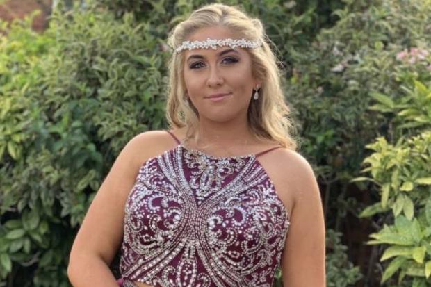Happy - Lauren Gibbinson at her prom with her invisible hearing aid which has transformed her everyday life