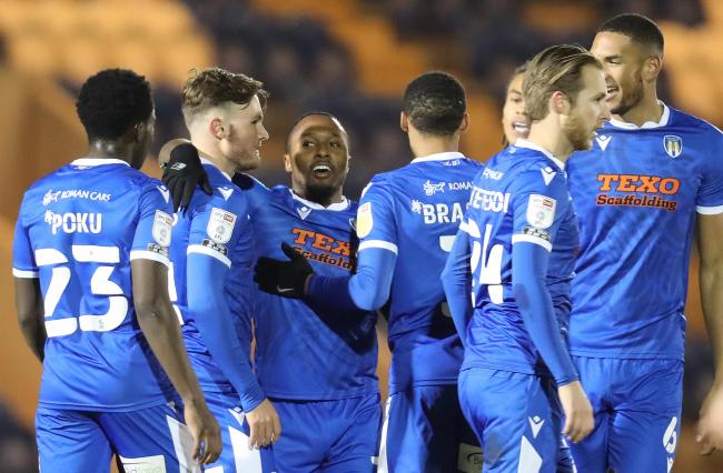 Magnificent - Colchester United's Callum Harriott (third from left) celebrates with his team-mates after scoring a superb goal against Crawley Town Picture: STEVE BRADING