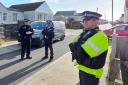 Investigating - police officers including Acting Ch Supt Taks Shah in Jaywick