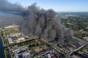 A fire burns at a vast shopping complex in Warsaw (Norbert Ofmanski/AP)