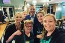 Phil Tufnell with catering staff at Frinton Golf Club.