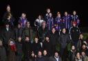 Maldon and Tiptree fans watch the action during the FA Cup second round match at Wallace Binder Stadium, Maldon..