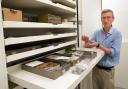 Museum -  Principal Curator of Vertebrates Dr Andrew Kitchener with a specimen from the Eocene bird collection at the museum. Picture: PA