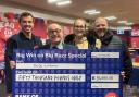 JACKPOT PRIZE: Kelly Williams (centre) with a Buzz Bingo cheque for £50,000