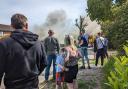 Concerned - Residents looked on as emergency services dealt with the fire