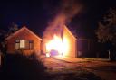 Ablaze - a van on fire outside Mr Watson's neighbour's home