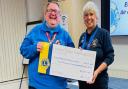 Proud - Lion President Paula Batchelor and Air Ambulance volunteer Sean Russell