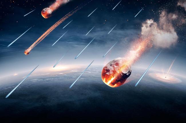 An artist’s impression of C-type asteroids and space dust raining down on the Earth