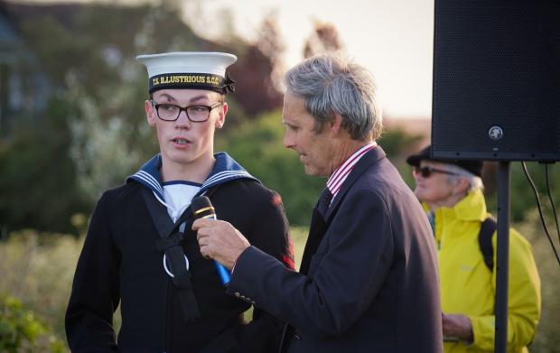 Clacton and Frinton Gazette: Presentation - Josh Stockwell, leading sea cadet speaks with David Eagle, Naze Protection Society acting chair. Credit: Paul Mynors