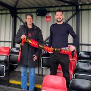 Setback: new Brightlingsea Regent manager Brett Munyard (right, with chairman Terry Doherty) saw his first home league game in charge cut short by a floodlight failure at North Road