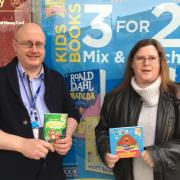 Readers - Gary Hales and Carole Garrett of WHSmith will oversee World Book Day at the store