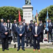 Anniversary - veterans and standard bearers along with Dan Casey, Peter Harris and Chris Amos at the end of the service. Picture: Will Lodge/TDC