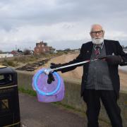 Determined - Tendring councillor Michael Talbot with one of the purple waste collection bags, used for community litter picks.