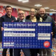 JACKPOT PRIZE: Kelly Williams (centre) with a Buzz Bingo cheque for £50,000