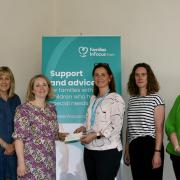 Cash Injection -  Nicola Yarnall, chair of Provide Community council of governors presents a cheque to the Families in Focus Essex team.