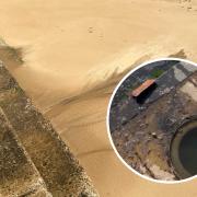 Fixed - the sewage leak was coming out of a manhole and was flowing onto Walton beach