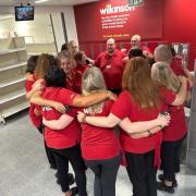 Emotional goodbye - staff at Clacton's Wilko shop bid farewell to each other
