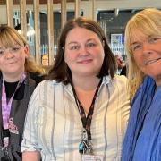 Visit - Linda Robson, left, visited the Smugglers Cove in Clacton and took pictures with the staff, Brooke Watts, Lisa Davies and Karen Wallace