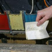Uncovered - A photograph of the historical note found during renovation works