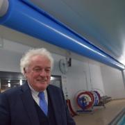 Covers - Councillor Mick Barry at Clacton Leisure Centre with the new pool cover