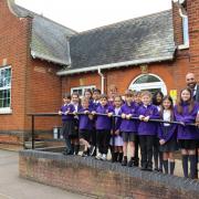 Proud - Students outside Holland Park Primary School