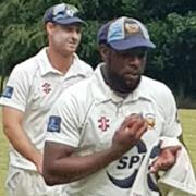 Starring role - Mervyn Westfield leaves the field after taking seven wickets for Frinton at Norwich